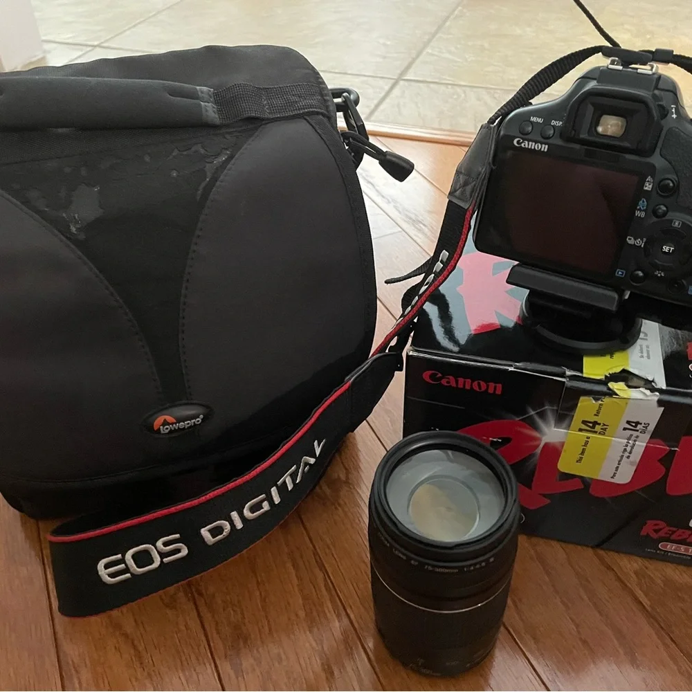 Canon Rebel Xsi DSLR camera with EF-S 18-55mm lens.